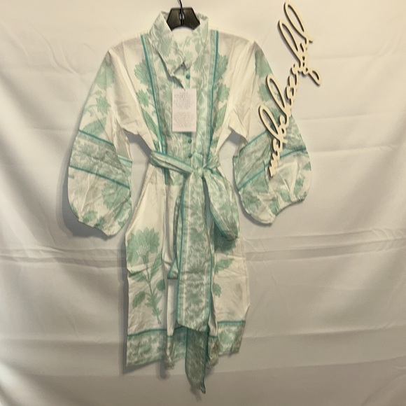 SUE SARTOR

Exclusive Light Turquoise Flounce Shorty Dahlia Print Mini Dress - Picture 7 of 12